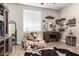 Whimsical bedroom with a vanity, wood-look flooring, and a beanbag covered in cowhide at 1444 W Gail Rd, San Tan Valley, AZ 85144