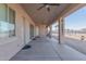 Wide view of the covered patio with ceiling fans and a view of the horse property at 1444 W Gail Rd, San Tan Valley, AZ 85144