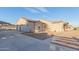 Three car garage exterior elevation of this single story home on a large lot at 1444 W Gail Rd, San Tan Valley, AZ 85144