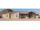 Single story home exhibiting a covered entryway and desert landscaping at 1444 W Gail Rd, San Tan Valley, AZ 85144