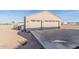 Detached two-car garage featuring neutral paint, and extended driveway at 1444 W Gail Rd, San Tan Valley, AZ 85144