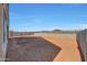 Large, blank-slate backyard with block wall fencing at 14782 W El Cortez Pl, Surprise, AZ 85387