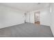 Spacious main bedroom leading into an ensuite bathroom at 14782 W El Cortez Pl, Surprise, AZ 85387