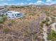 Aerial view of a modern home nestled in the desert landscape at 15642 E Palatial Dr, Fountain Hills, AZ 85268