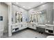 Contemporary bathroom features double sink vanity, pendant lighting, and tiled walls at 15642 E Palatial Dr, Fountain Hills, AZ 85268