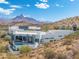 Modern home exterior with desert landscaping and mountain views at 15642 E Palatial Dr, Fountain Hills, AZ 85268