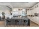 Modern kitchen with an island, stainless steel appliances, and elegant pendant lighting at 15642 E Palatial Dr, Fountain Hills, AZ 85268