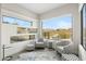 Bright living room with mountain views and modern patterned furniture at 15642 E Palatial Dr, Fountain Hills, AZ 85268