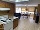 Open-concept kitchen seamlessly connects with the dining area, featuring modern appliances at 17429 E La Pasada Dr, Fountain Hills, AZ 85268