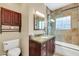 Charming bathroom includes tiled shower and granite vanity at 1822 N 16Th Ave, Phoenix, AZ 85007