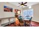 Bright dining area featuring hardwood floors and windows providing ample natural light, leading into the kitchen at 1822 N 16Th Ave, Phoenix, AZ 85007