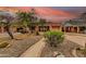 View of the property and walkway surrounded by desert landscaping, plus an orange sunset backdrop at 1822 N 16Th Ave, Phoenix, AZ 85007