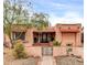 Charming single-story home with a tiled roof, stucco exterior, and low-maintenance desert landscaping at 1822 N 16Th Ave, Phoenix, AZ 85007