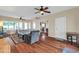 Spacious living room with hardwood floors, neutral paint, and a ceiling fan for added comfort at 1822 N 16Th Ave, Phoenix, AZ 85007