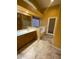 Bright bathroom featuring a soaking tub and a dual sink vanity at 1870 N 128Th Dr, Avondale, AZ 85392