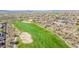 Aerial view showcasing the golf course, desert landscape, and luxury homes in the community at 1918 W Medinah Ct, Anthem, AZ 85086