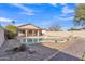 Backyard with desert landscaping, cactus, swimming pool and patio at 2019 E Wahalla Ln, Phoenix, AZ 85024