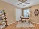 Bedroom with wood-style flooring and a desk by the window at 2019 E Wahalla Ln, Phoenix, AZ 85024