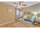 Bedroom with a ceiling fan, wood flooring, and coordinated bedding at 2019 E Wahalla Ln, Phoenix, AZ 85024