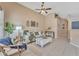 Comfortable living room with vaulted ceiling, neutral color scheme, and stylish furnishings at 2019 E Wahalla Ln, Phoenix, AZ 85024