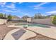 Backyard pool with basketball hoop and desert landscaping at 2019 E Wahalla Ln, Phoenix, AZ 85024