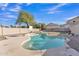 Backyard swimming pool with desert landscaping and fence at 2019 E Wahalla Ln, Phoenix, AZ 85024