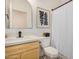 Stylish bathroom with modern sink, framed mirror, and black and white patterned tile at 22864 E Via Del Sol --, Queen Creek, AZ 85142