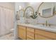 Bright bathroom with dual vanity and a framed mirror at 22864 E Via Del Sol --, Queen Creek, AZ 85142