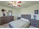 Bedroom with a ceiling fan and dresser at 233 N 21St St, Coolidge, AZ 85128