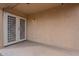 Covered patio area with access through glass paneled french doors at 233 N 21St St, Coolidge, AZ 85128