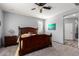 Main bedroom featuring a ceiling fan, soft carpet, and a warm, inviting space for relaxation and rest at 24027 N 164Th Dr, Surprise, AZ 85387