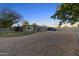 Expansive backyard featuring a mix of gravel, a lawn, and an outdoor area at 2709 E Clarendon Ave, Phoenix, AZ 85016