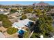 Aerial view of home in a neighborhood setting, complete with a private pool and mountain views at 3511 E Elm St, Phoenix, AZ 85018