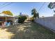 Spacious backyard featuring a covered patio and a block wall fence for added privacy at 3511 E Elm St, Phoenix, AZ 85018