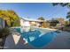 Backyard pool view featuring a gunite surround providing a private retreat for relaxation and outdoor enjoyment at 3511 E Elm St, Phoenix, AZ 85018