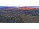 Distant community view surrounded by desert landscaping, with a mountain range in the background at 39347 N Old Stage Rd, Cave Creek, AZ 85331