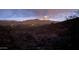 Night view of a mountain range and city lights at 39347 N Old Stage Rd, Cave Creek, AZ 85331
