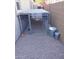 Backyard with gravel, cinderblock fence, and a covered metal dog run for pet owners at 4216 E Desert Marigold Dr, Cave Creek, AZ 85331