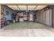 Spacious garage with epoxy floors, ample storage, and well-organized workspace at 4216 E Desert Marigold Dr, Cave Creek, AZ 85331