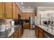 Well-equipped kitchen featuring stainless steel appliances and tile flooring at 4267 S Strong Box Rd, Gold Canyon, AZ 85118