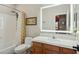 Well-lit bathroom featuring a vanity with modern fixtures and a shower/tub combo at 4502 E Night Owl Ln, Cave Creek, AZ 85331