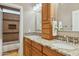 Bathroom with double sinks, granite counters, a tile backsplash, and a separate tub at 4502 E Night Owl Ln, Cave Creek, AZ 85331