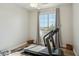 Dedicated exercise room featuring a treadmill and natural light from the window at 4502 E Night Owl Ln, Cave Creek, AZ 85331