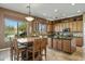 Inviting kitchen with a breakfast table, granite countertops, and custom cabinetry at 4502 E Night Owl Ln, Cave Creek, AZ 85331