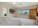 Serene primary bedroom featuring a king bed, scenic views, and a neutral color palette at 4502 E Night Owl Ln, Cave Creek, AZ 85331