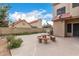 Spacious backyard featuring a concrete patio with seating, perfect for outdoor entertaining at 4683 W Dublin St, Chandler, AZ 85226