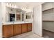 A full bathroom features double sinks, large mirrors, and a tile floor at 4683 W Dublin St, Chandler, AZ 85226