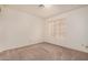 Empty bedroom featuring neutral walls, a small window, and carpeted floors at 4683 W Dublin St, Chandler, AZ 85226