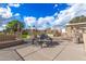 Covered community picnic area with metal picnic tables and benches for relaxation and entertaining at 4683 W Dublin St, Chandler, AZ 85226