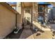 Front entrance showcasing an iron gate and a beautiful wreath on the front door at 474 E Baylor Ln, Gilbert, AZ 85296